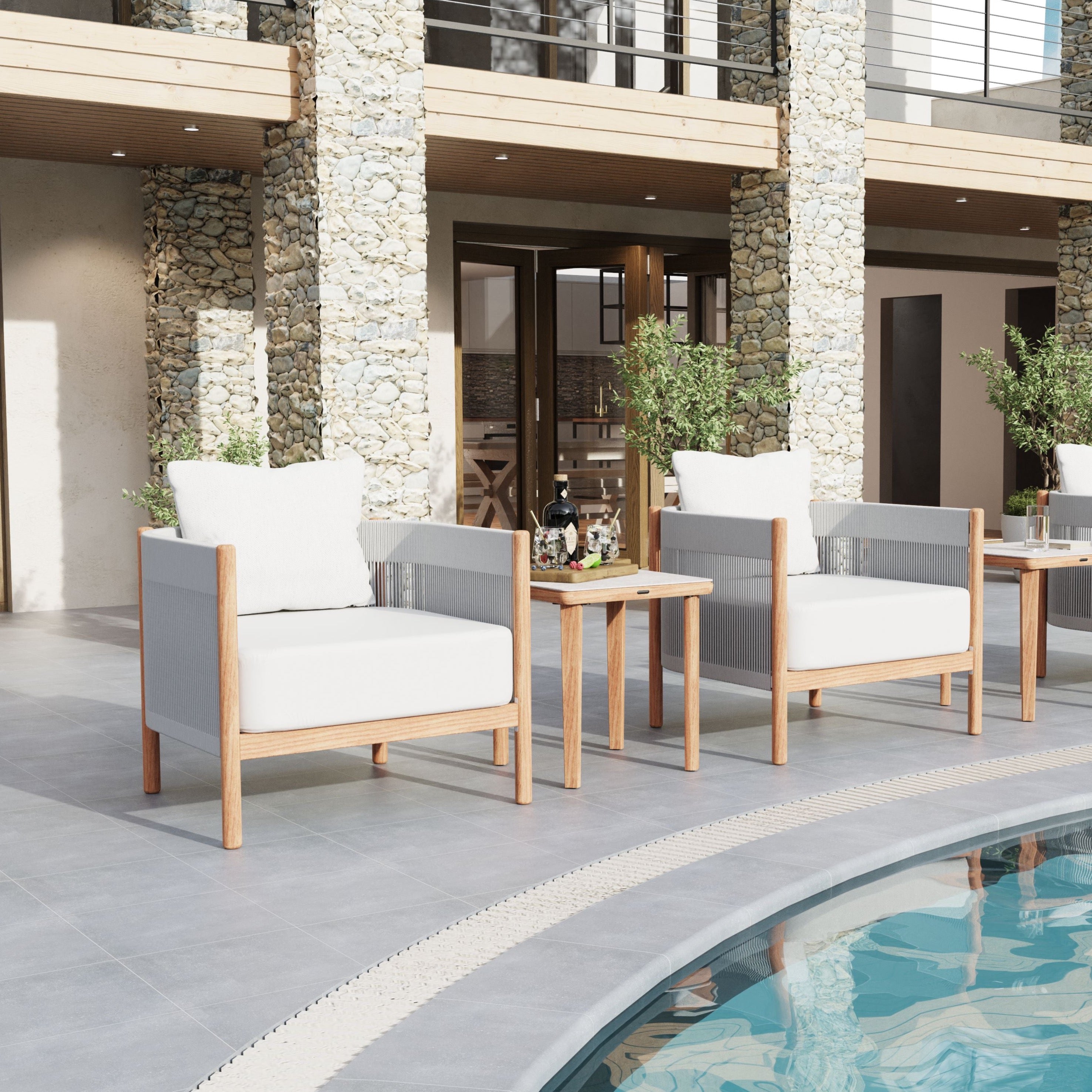 Der Barlow Tyrie Cocoon Sessel ist ein eleganter Sessel aus Aluminium mit einer geschwungenen Rückenlehne aus geflochtenem Chalk Olefin. Die Beine bestehen aus Teakholz, und der Sessel ist mit bequemen Kissen aus Sunbrella-Stoff in Kreideweiß ausgestattet. Mit einer Sitzhöhe von 46 cm bietet er Komfort und eine entspannte Haltung. Maße: 84 cm breit, 84 cm tief und 72 cm hoch. Ideal für den Außenbereich.