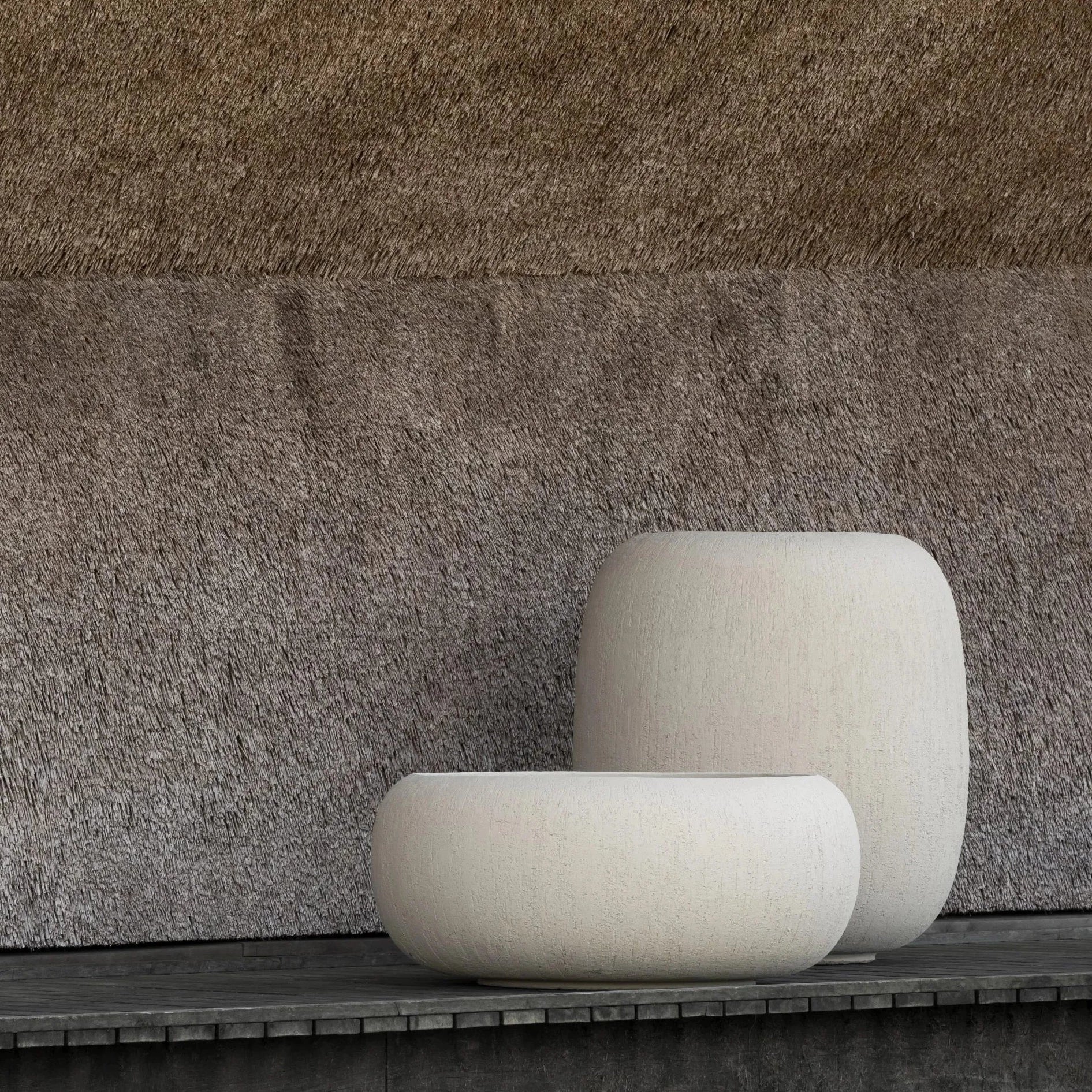 Domani Melides Topf Ø100cm in Travertine auf Terrasse bei Sonnenlicht