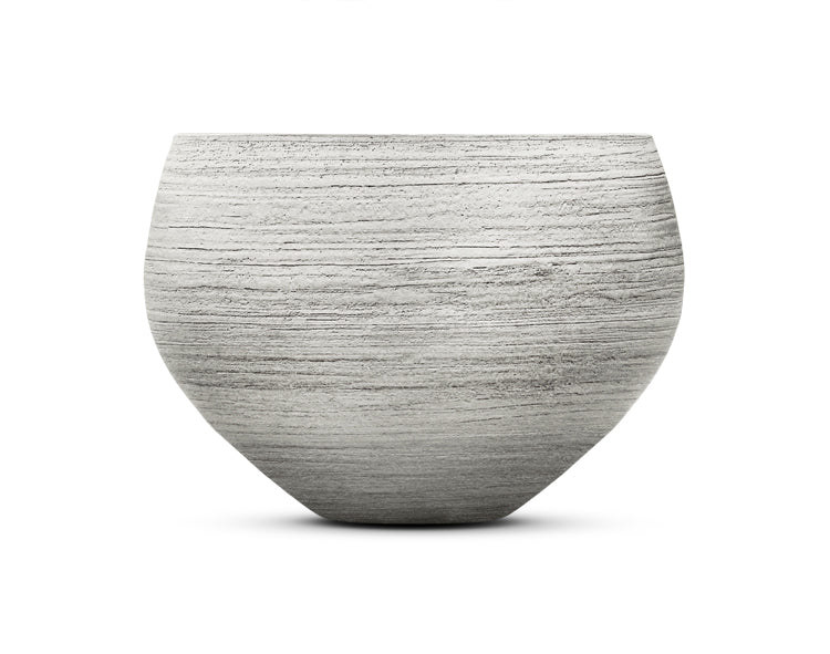 Nahaufnahme der Domani Nuuk Oberfläche mit weichen Weißnuancen