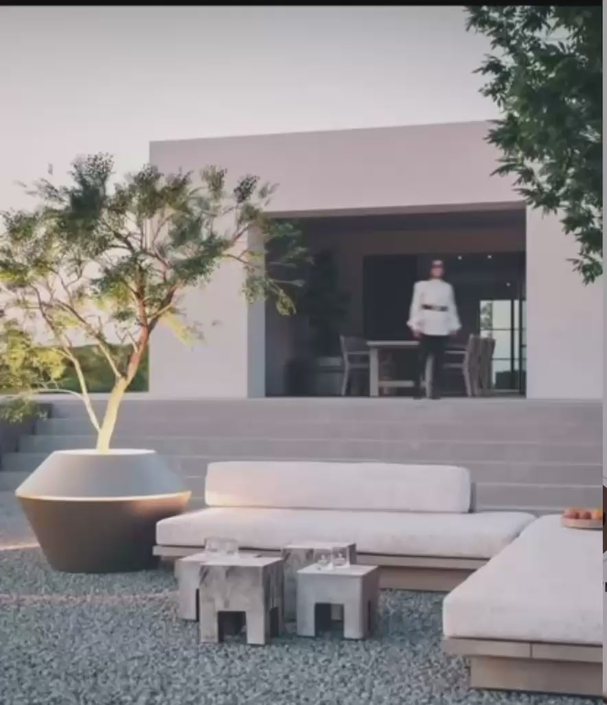 Video laden: Modern gestalteter Oyster Pflanzkübel aus recyceltem Aluminium, ausgestattet mit dimmbarer LED-Beleuchtung für eine warme Lichtatmosphäre.