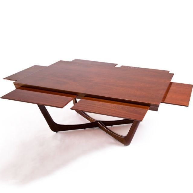 Unopiu C'est la vie table made of mahogany with extendable tabletops 
