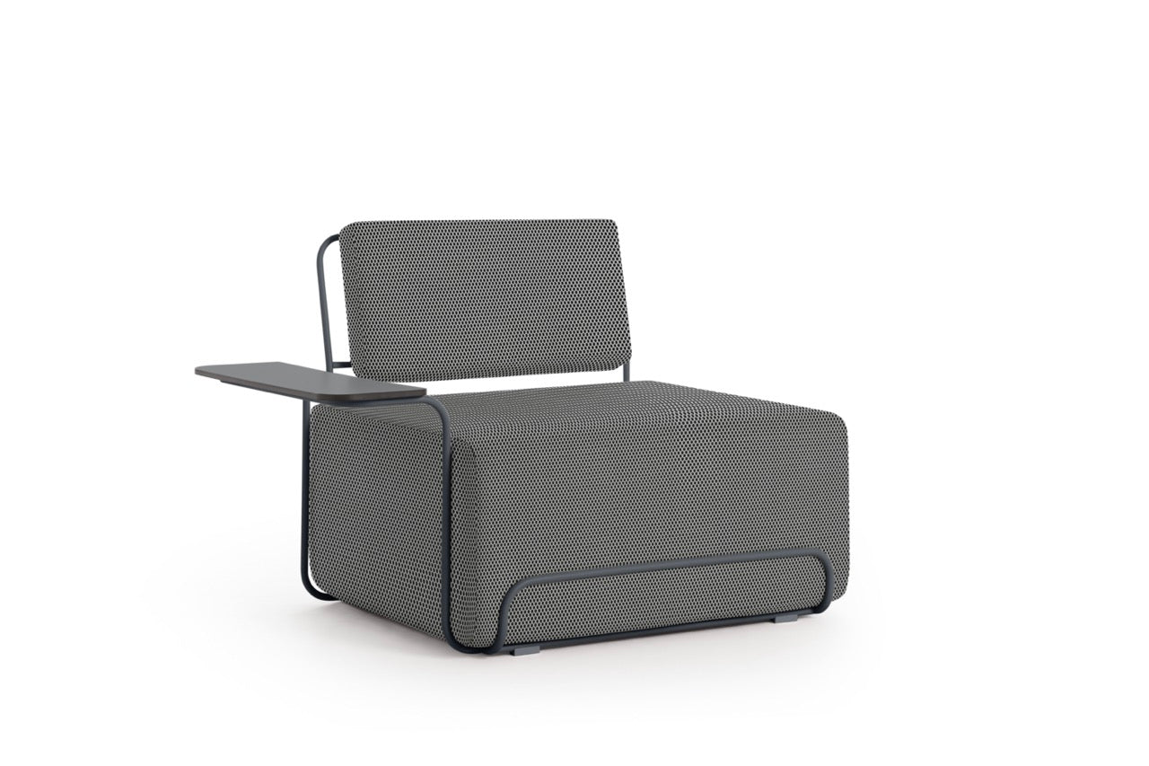 diabla Lilly lounge chair with armrest table on the left 